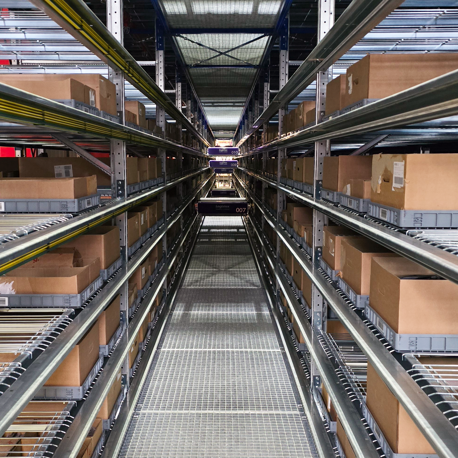 Loadhog automation tray stored within a high-density racking system, demonstrating efficient use of space and seamless integration with automated warehousing solutions.