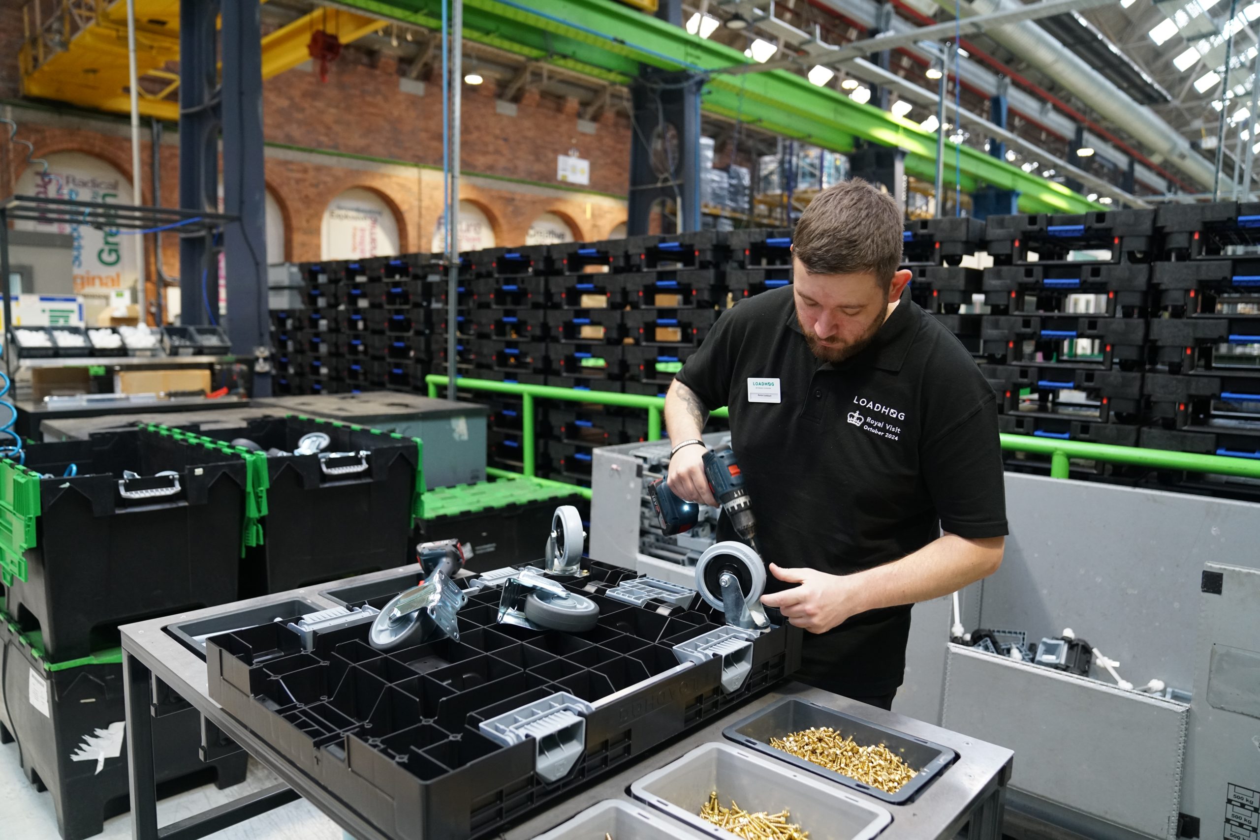 Loadhog employee building a Dolly Max for a customer